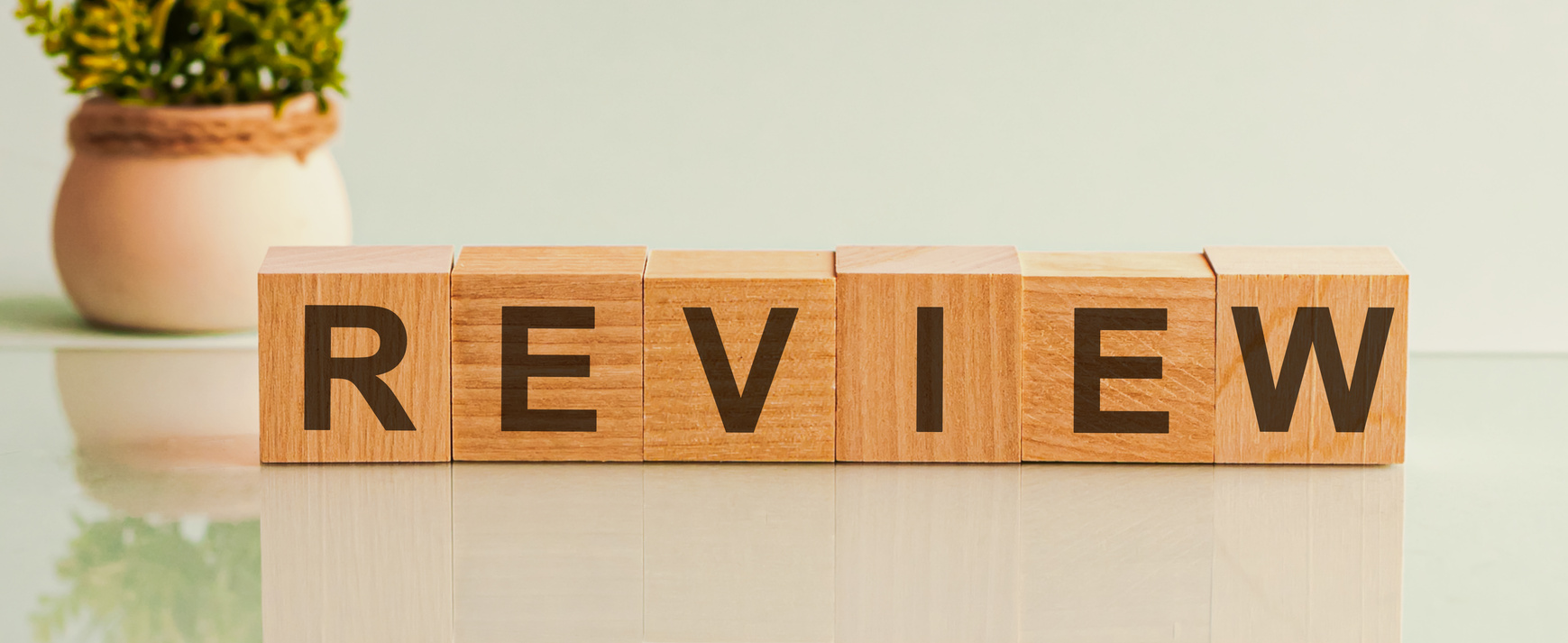 Wooden blocks with the word Review. Customer review concept. Service rating. Feedback. Reviewing, auditing, reviewer.